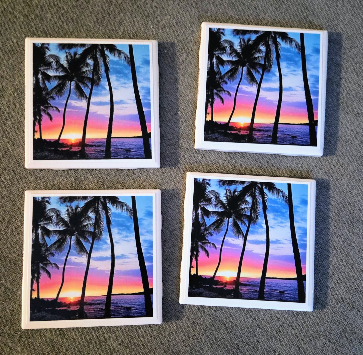 Handcrafted set of 4 individual 4"x4” ceramic tile coasters featuring original designs/uplifting messages. Sealed, durable, and perfect for everyday use/gifting.