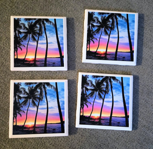Handcrafted set of 4 individual 4"x4” ceramic tile coasters featuring original designs/uplifting messages. Sealed, durable, and perfect for everyday use/gifting.