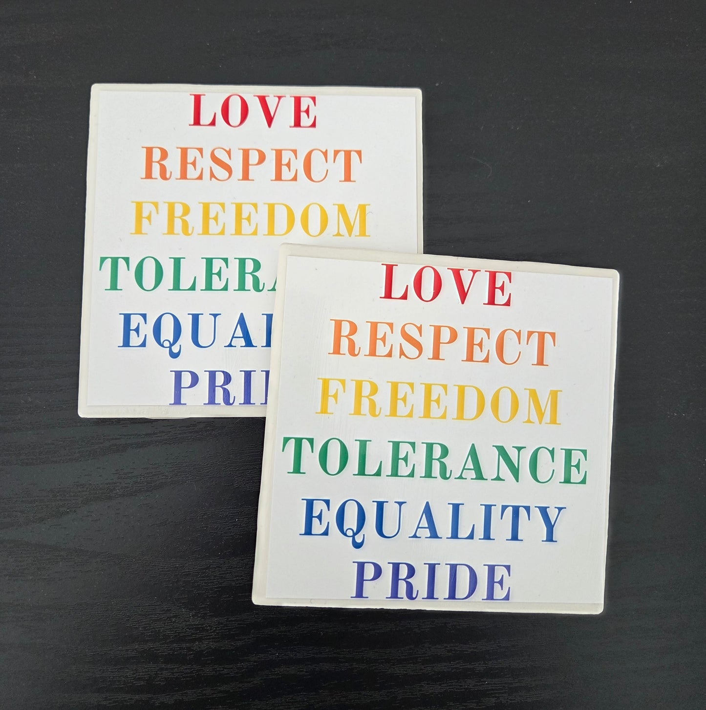 Handcrafted set of 4 individual 4"x4” ceramic tile coasters featuring original designs/uplifting messages. Sealed, durable, and perfect for everyday use/gifting.