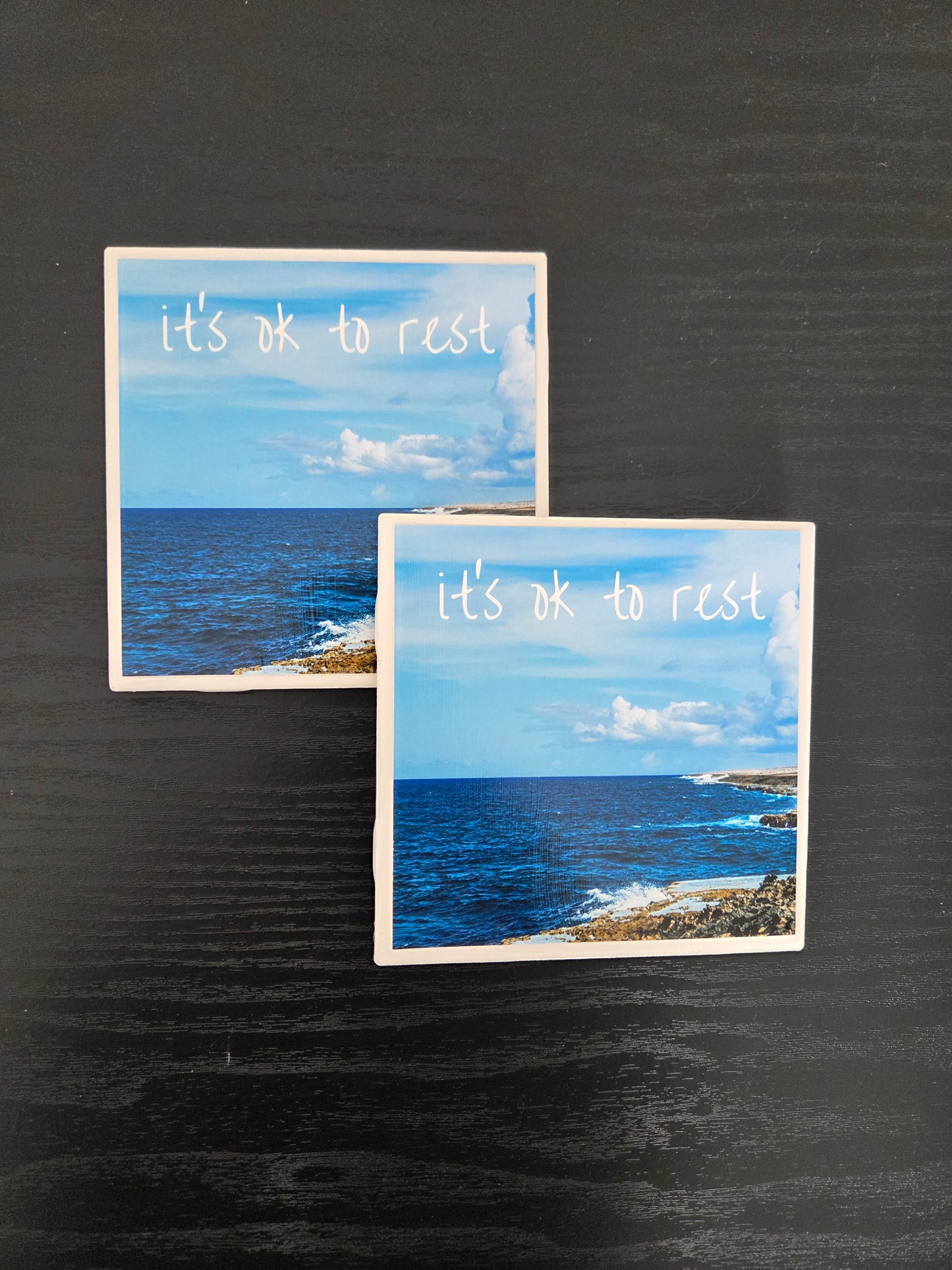 Handcrafted set of 4 individual 4"x4” ceramic tile coasters featuring original designs/uplifting messages. Sealed, durable, and perfect for everyday use/gifting.