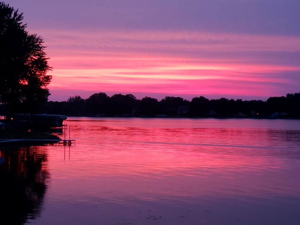 Set of 4 custom-made pink sunset at the lake ceramic coasters.